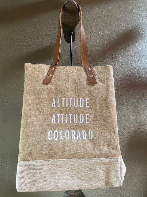 Wine Tote. Natural. White text: Altitude Attitude Colorado